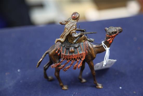 Franz Bergman. A cold painted bronze model of an arab riding a camel, height 5in.